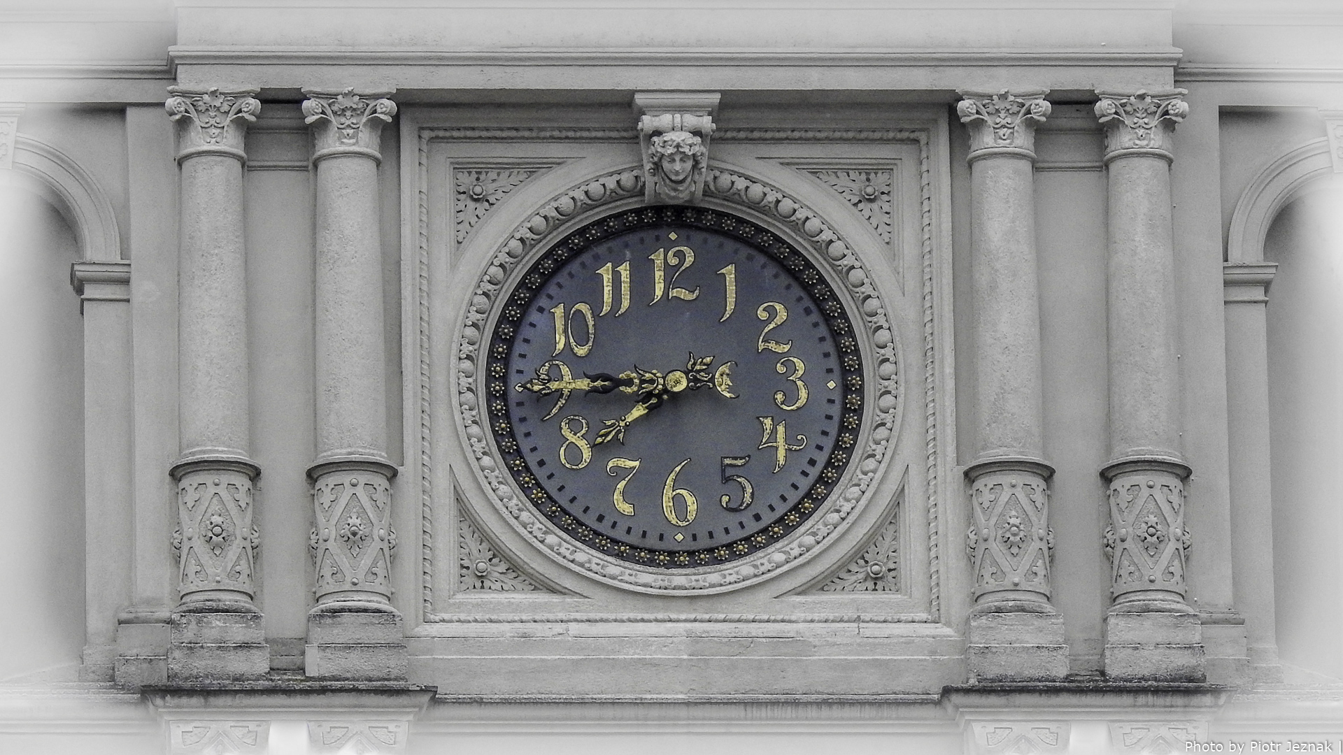 The facade clock on the Graz City Hall.